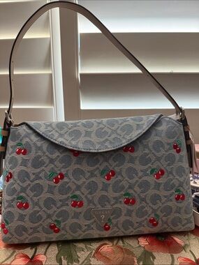 GUESS Light Blue Cherry Logo Jacquard Shoulder Bag magnetic closure